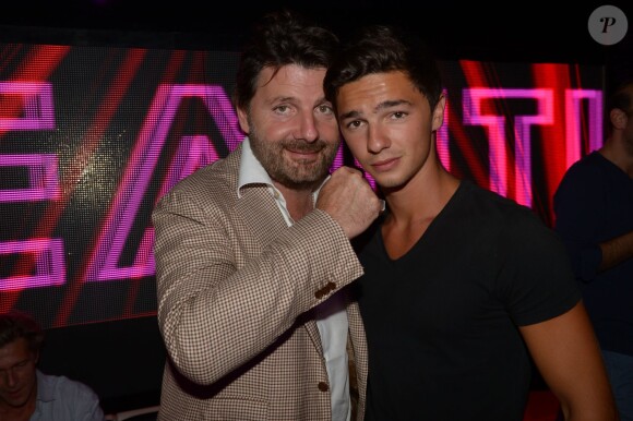 Exclusif - Philippe Lellouche et son fils aîné Sam au VIP Room à Saint-Tropez, le 23 juillet 2014.