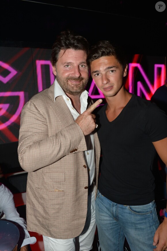 Exclusif - Philippe Lellouche et son fils aîné Sam au VIP Room à Saint-Tropez, le 23 juillet 2014.