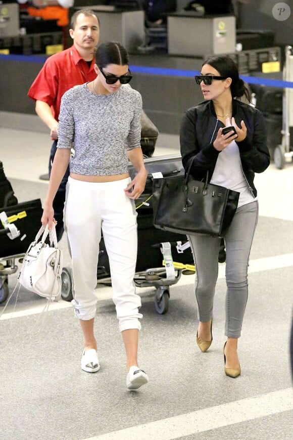 Kendall Jenner et Kim Kardashian à Paris, le 10 juillet 2014.