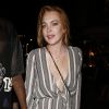 Lindsay Lohan, épanouie, quitte un club de Londres le 31 juillet 2014