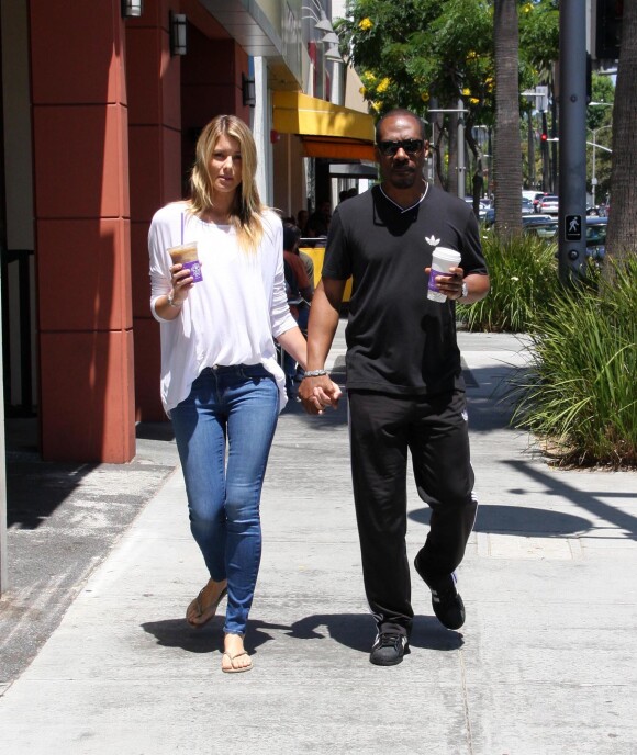 Paige Butcher et Eddie Murphy à Beverly Hills, le 17 juillet 2014.