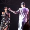 Rihanna, invitée surprise par Eminem lors de sa performance au festival Lollapalooza, monte sur scène et interprète Love the way you lie. Chicago, le 1er août 2014.