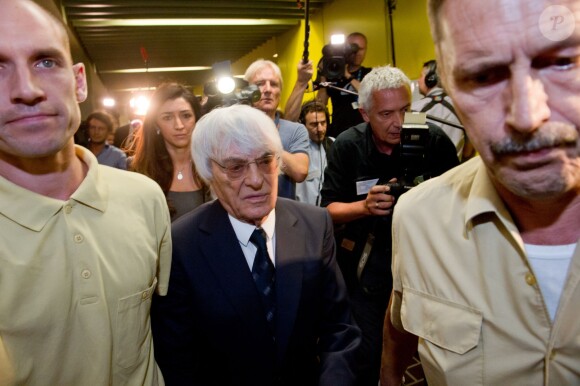 Le patron de la F1 Bernie Ecclestone et son avocat Norbert Scharf au palais de justice de Munich, le 5 août 2014.