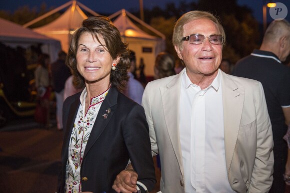 Orlando et Sylvie Rousseau au spectacle Le fils du comique, lors du 30e Festival de Ramatuelle, le 7 août 2014.