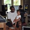 Kanye West et sa fille North en studio, au Mexique. Août 2014.