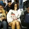 Rihanna assiste au match de basketball caritatif RN Summer Classic au Barclays Center. Brooklyn, le 21 août 2014.