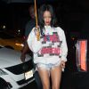 Rihanna arrive au Finale à New York, habillée d'un pull de la collection Run DMC pour adidas originals, d'un mini-short en jean et de sandales Manolo Blahnik. Le 21 août 2014.