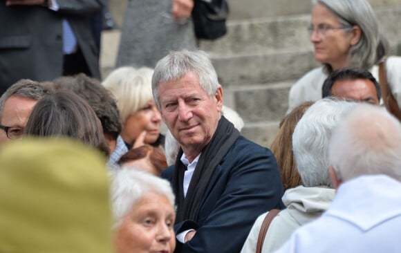 Régis Wargnier aux obsèques de Ménie Grégoire, ex-animatrice star de RTL, en présence de ses enfants et de sa famille, en l'église Saint-Roch à Paris le 21 août 2014.