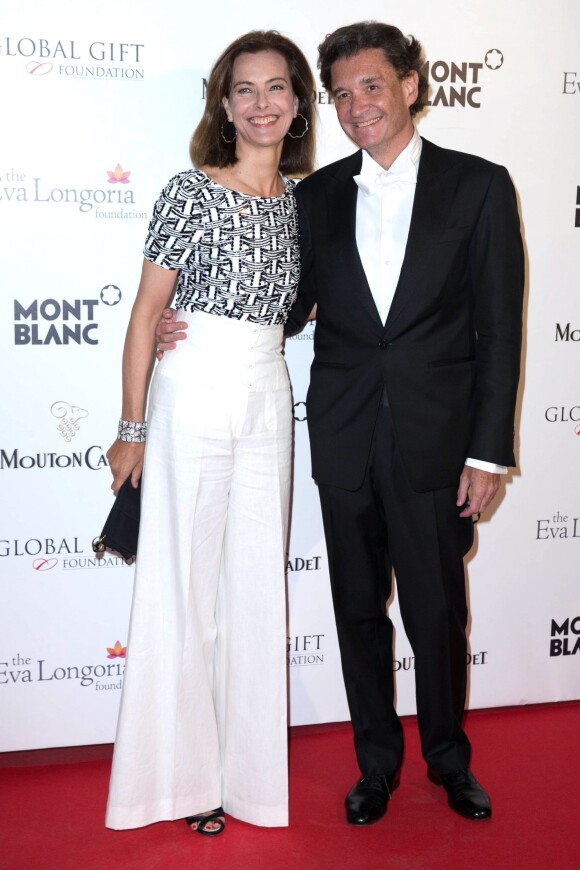 Carole Bouquet et son compagnon Philippe Sereys de Rothschild - Soirée "Global Gift Gala" lors du 67e festival international du film de Cannes, le 16 mai 2014.