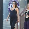 L'actrice Mila Kunis, très enceinte, est allée déjeuner avec une amie après un cours de yoga à Los Angeles, le 23 août 2014.