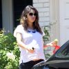 Exclusif - L'actrice Mila Kunis enceinte se rend chez une amie à Beverly Hills, le 9 août 2014.