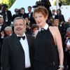 Natacha Polony (habillée en Karl Lagerfeld) et son mari Perico Légasse - Montée des marches du film "Pour une poignée de dollars" pour la cérémonie de clôture du 67e Festival du film de Cannes. Le 24 mai 2014.