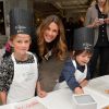 Exclusif - Sophie Thalmann et ses enfants Charlie et Mika lors d'un goûter de Pâques " Tout Chocolat " à l'Hôtel de Vendôme à Paris le 9 avril 2014.
