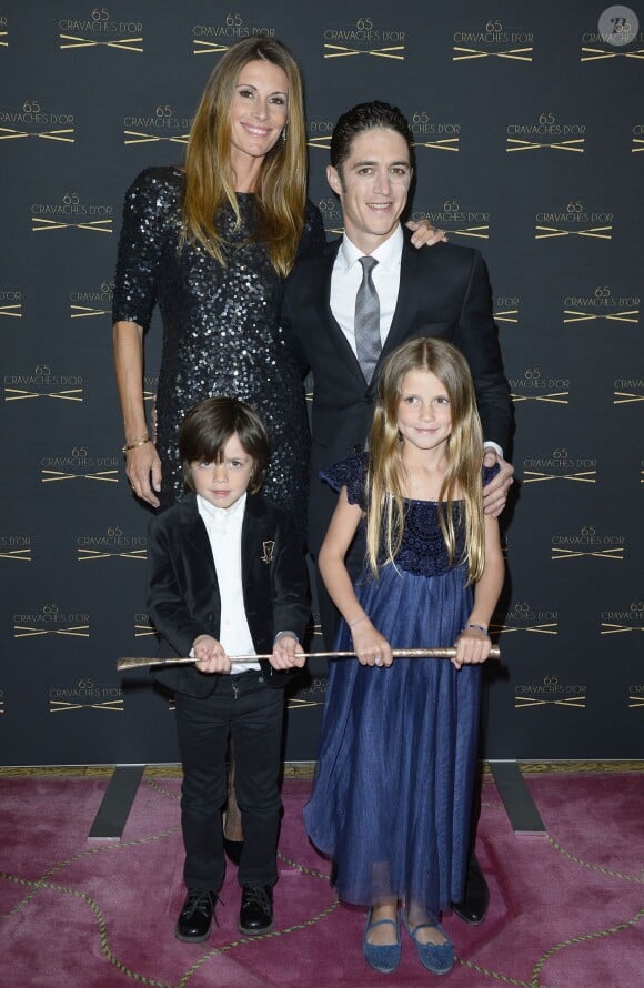 Sophie Thalmann, son mari Christopher Soumillon et leur enfants Charlie et Mika - 65e édition des Cravaches d'Or au Théâtre des Champs-Elysées à Paris le 14 mars 2014.