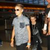 David Beckham et ses enfants Romeo, Cruz, et Harper surpris à l'aéroport LAX à Los Angeles, le 29 août 2014