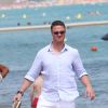 Ralf Schumacher débarque sur la plage de Pampelonne pour un déjeuner au Nikki Beach avec son épouse et ses amis, le 21 août 2014