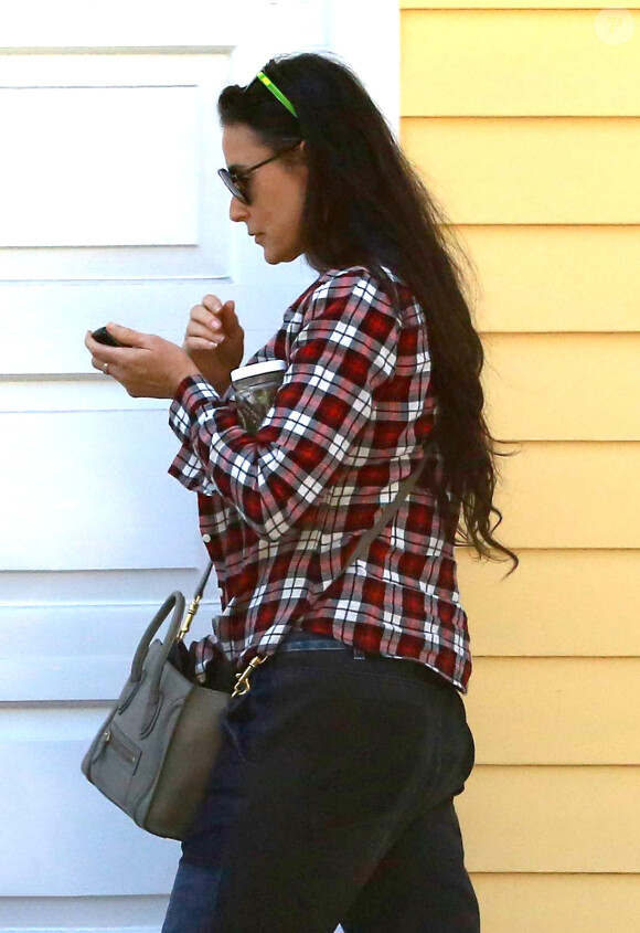 Tallulah Willis dans les rues de Los Angeles avec sa mère Demi Moore, le 5 septembre 2014.