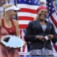 Caroline Wozniacki et Serena Williams après leur finale à l'US Open, à l'USTA Billie Jean King National Tennis Center de New York le 7 septembre 2014