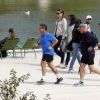 L'ancien président Nicolas Sarkozy en train de faire son jogging avec ses gardes du corps au jardin des Tuileries, le 10 septembre 2014, à Paris.