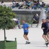 Nicolas Sarkozy en train de faire son jogging avec ses gardes du corps au jardin des Tuileries, le 10 septembre 2014, à Paris.