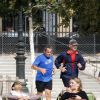 Nicolas Sarkozy en train de faire son jogging avec ses gardes du corps au jardin des Tuileries, le 10 septembre 2014, à Paris.
