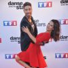 Joyce Jonathan et Julien Brugel lors du photocall de présentation de la nouvelle saison de "Dance avec les Stars 5" au pied de la tour TF1 à Paris, le 10 septembre 2014