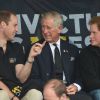 Le prince Charles et ses fils les princes Harry et William assistent aux Invictus Games 2014 (Jour 1) à Londres, le 11 septembre 2014.