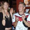 Bastian Schweinsteiger et Sarah Brandner lors de la soirée célébrant la victoire de l'équipe allemande en finale de la Coupe du monde face à l'Argentine, à l'hôtel Sheraton de Rio, le 13 juillet 2014