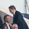 Michel Denisot, Nicolas Sarkozy, Ary Abittan, Lilian Thuram, Alain Boghossian - Nicolas Sarkozy assiste au match de football entre le PSG et Lyon au Parc des Princes à Paris le 21 septembre 2014.
