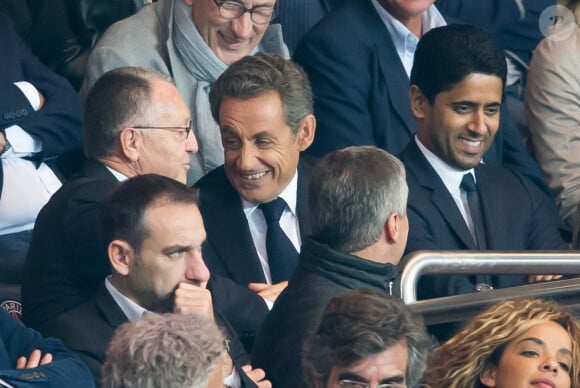 Jean-Michel Aulas, Nicolas Sarkozy, Nasser Al-Khelaïfi assistent au match de foot entre le PSG et Lyon au Parc des Princes à Paris le 21 septembre 2014.