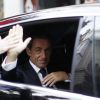 Nicolas Sarkozy quitte son domicile pour se rendre sur le plateau du journal télévisé de France 2 à Paris le 21 septembre 2014.