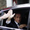Nicolas Sarkozy quitte son domicile pour se rendre sur le plateau du journal télévisé de France 2 à Paris le 21 septembre 2014.