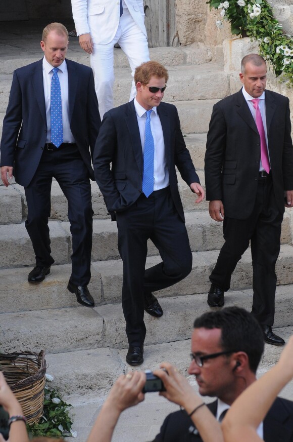 Le prince Harry au mariage de son ami Charles Gilkes et sa compagne Anneke von Trotha Taylor au château Charles V à Monopoli, en Italie, le 19 septembre 2014