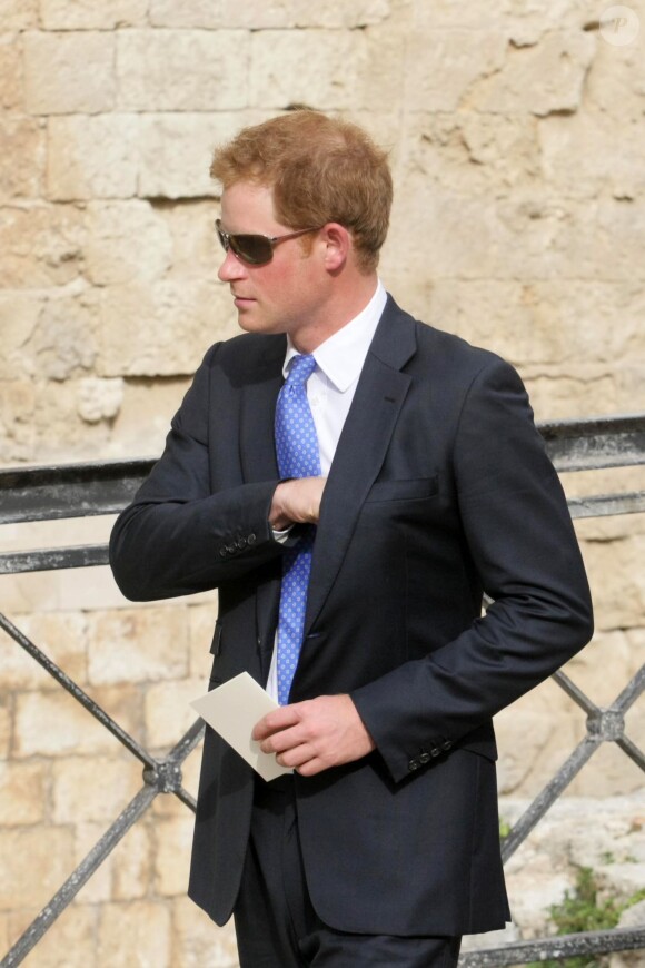 Le prince Harry au mariage de son ami Charles Gilkes et sa compagne Anneke von Trotha Taylor au château Charles V à Monopoli, en Italie, le 19 septembre 2014
