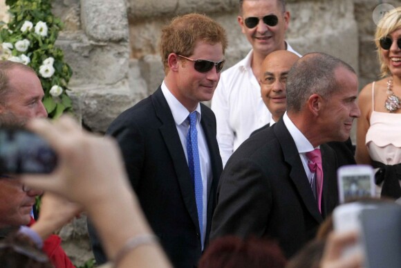 Le prince Harry au mariage de son ami Charles Gilkes et sa compagne Anneke von Trotha Taylor au château Charles V à Monopoli, en Italie, le 19 septembre 2014