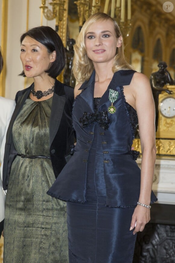 Diane Kruger et Fleur Pellerin - Remise de la médaille des Arts et des Lettres à Diane Kruger au ministère de la Culture à Paris le 22 septembre 2014.