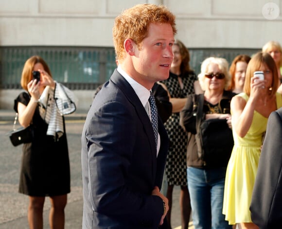 Le prince Harry lors de la cérémonie des 10e WellChild Awards, le 22 septembre 2014 au Hilton de Londres, remis par l'association WellChild qui soutient les enfants malades, dont il est le parrain depuis 2007.