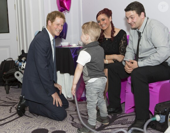 Le prince Harry lors de la cérémonie des 10e WellChild Awards, le 22 septembre 2014 au Hilton de Londres, remis par l'association WellChild qui soutient les enfants malades, dont il est le parrain depuis 2007.