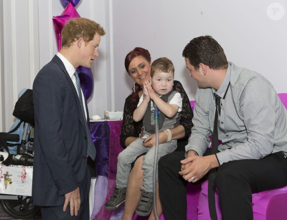 Le prince Harry lors de la cérémonie des 10e WellChild Awards, le 22 septembre 2014 au Hilton de Londres, remis par l'association WellChild qui soutient les enfants malades, dont il est le parrain depuis 2007.