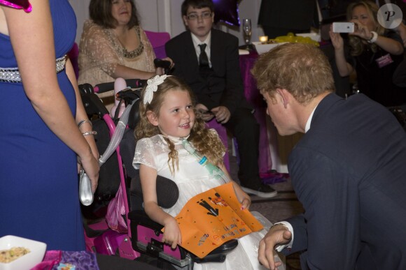 Le prince Harry lors de la cérémonie des 10e WellChild Awards, le 22 septembre 2014 au Hilton de Londres, remis par l'association WellChild qui soutient les enfants malades, dont il est le parrain depuis 2007.