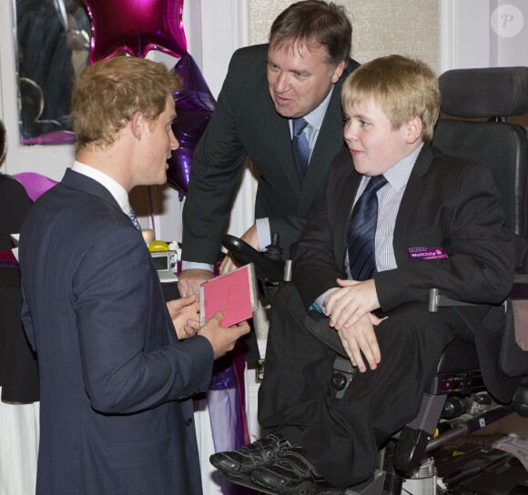 Le prince Harry lors de la cérémonie des 10e WellChild Awards, le 22 septembre 2014 au Hilton de Londres, remis par l'association WellChild qui soutient les enfants malades, dont il est le parrain depuis 2007.