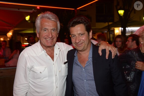 Exclusif - Le producteur Gilbert Coullier et Laurent Gerra à la soirée VIP Room à Saint-Tropez le 5 août 2014.