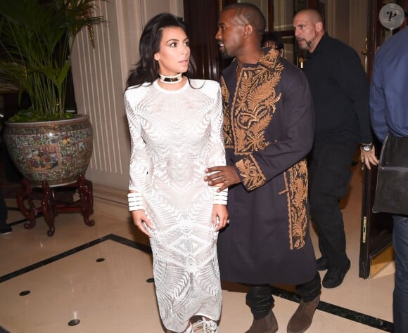 Kanye West et Kim Kardashian arrivent au Grand Hôtel de Paris pour assister au défilé Balmain. Paris, le 25 septembre 2014.
