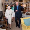  La reine Elizabeth II et David Cameron à Chequers, maison de campagne du Premier ministre et de son épouse dans le  Buckinghamshire, le 28 février 2014.  