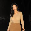 Kim Kardashian quitte son hôtel Le Royal Monceau et se rend à une soirée pendant la Fashion Week à Paris, le samedi 27 septembre 2014.