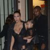 Kim Kardashian, Kanye West et leur fille North quittent le Royal Monceau pour se rendre au Lycée Carnot, lieu du défilé Givenchy. Paris, le 28 septembre 2014.