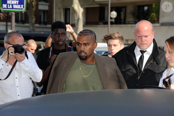 Kanye West lors du défilé Céline printemps-été 2015 au Tennis Club de Paris. Le 28 septembre 2014.