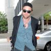 Robert Pattinson arrive à l'aéroport LAX de Los Angeles pour prendre un avion pour Toronto, le 8 septembre 2014.