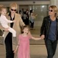  Nicole Kidman avec ses filles Sunday et Faith, et son mari Keith Urban, rentrant &agrave; Los Angeles le 23 septembre 2014. Ils &eacute;taient en Australie pour les obs&egrave;ques du p&egrave;re de la com&eacute;dienne, Antony Kidman 