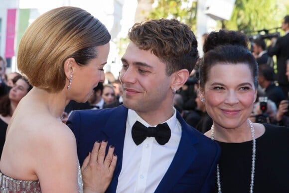 Suzanne Clément, Xavier Dolan et Anne Dorval pour la cérémonie de clôture du 67e Festival du film de Cannes le 24 mai 2014.